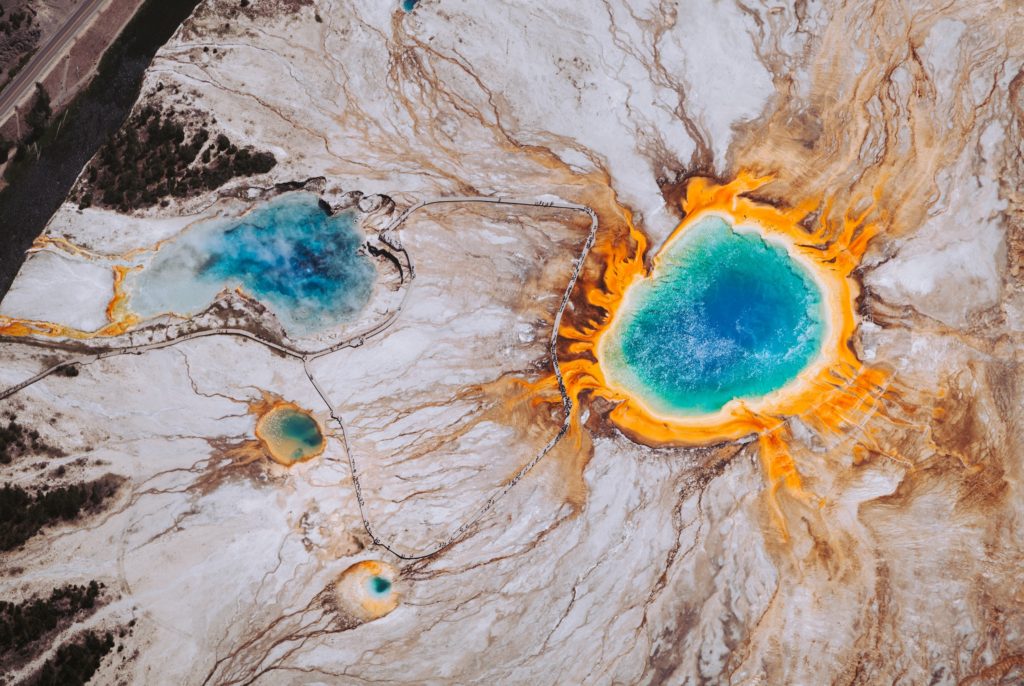 blue, yellow, and orange colors of the Grand Prismatic Spring at Yellowstone